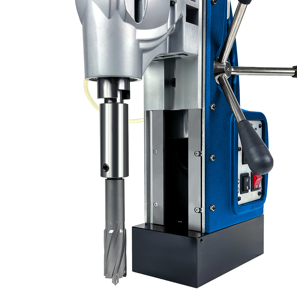 AC120 SuperBrute drilling deep 4 inch hole in thick pipe with coolant tank visible